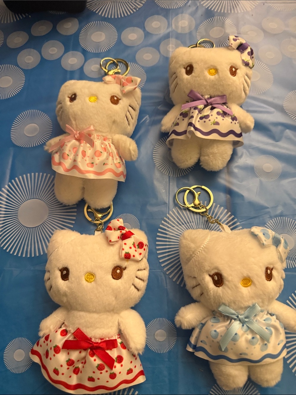 Hello Kitty Plush Keychain Set - Pink, Purple, Red, Blue Dresses set 4